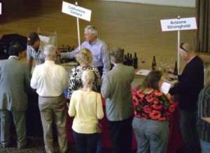 (From left to right) Arizona wineries Caduceus Cellars and Arizona Stronghold pour to curious TAPAS-goers. (Photo by Cynthia Bournellis)