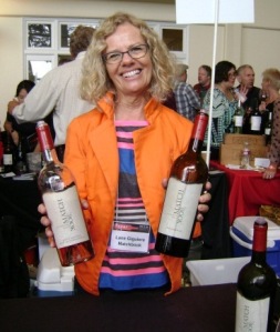 Lane Giguiere, owner of Matchbook Wine, offers a splash of both the Tempranillo Estate Rosé and the 2009 Dunnigan Hills Tempranillo. (Photo by Cynthia Bournellis) 